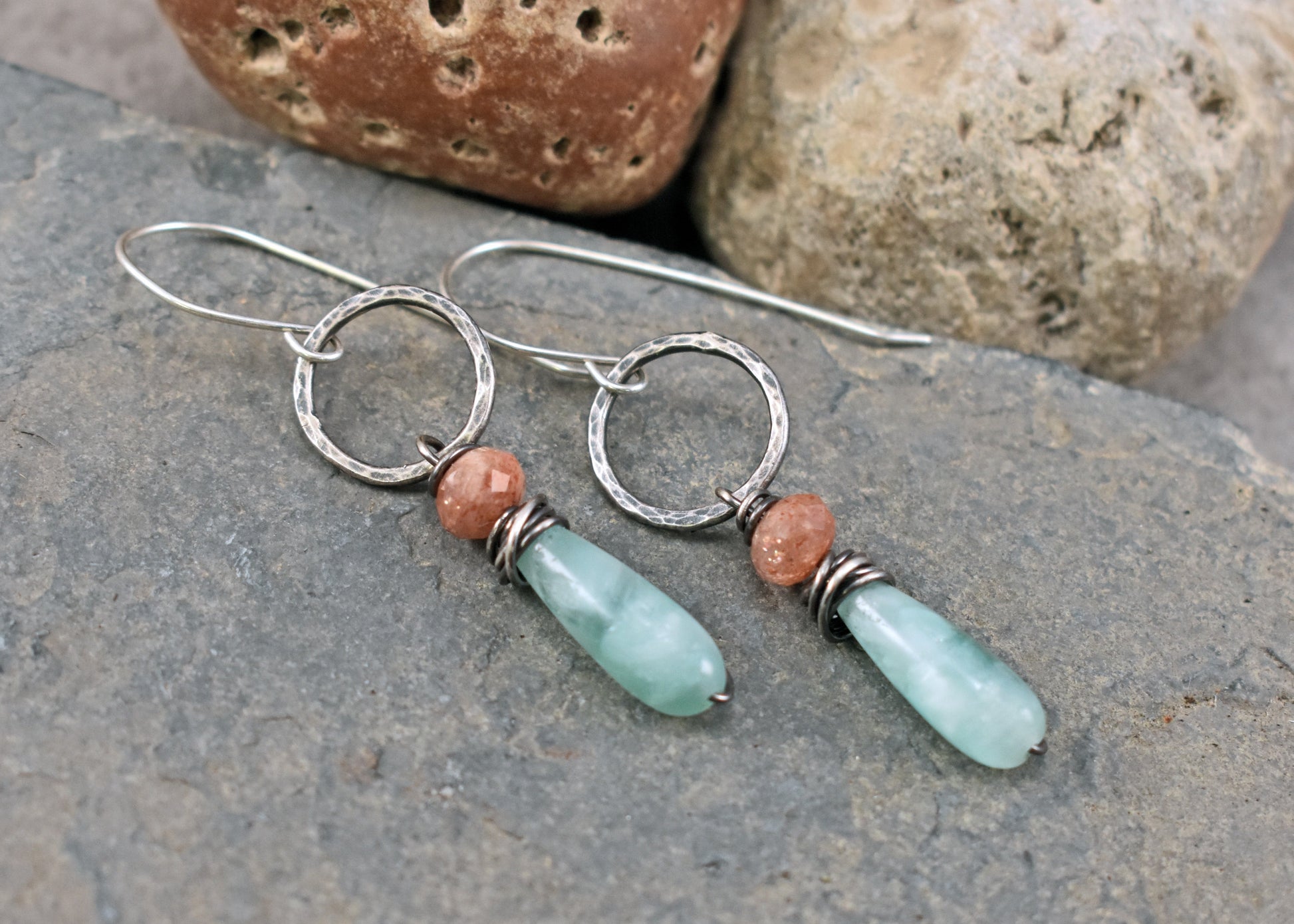 Sterling silver earrings with green and orange gemstones